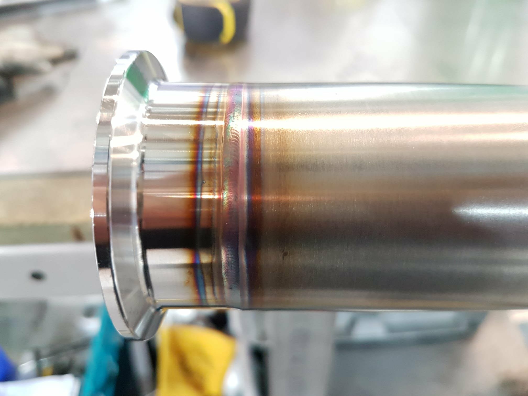 Precision TIG welded stainless steel pipe joint.